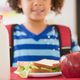Illustration for article titled Anonymous benefactor who paid off $10,000 in school lunch debt swells our Grinch heartsem/em